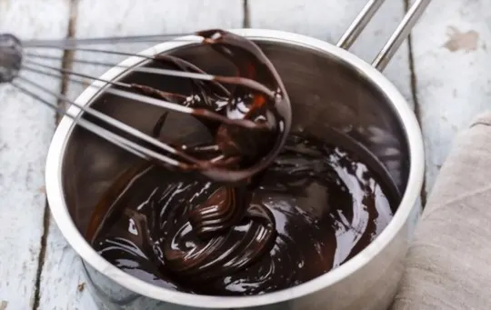 dark chocolate sauce with roasted almonds