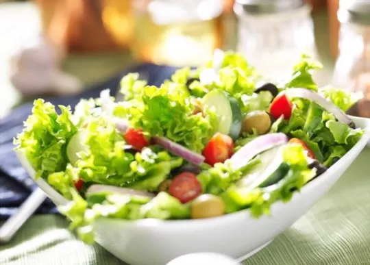 green salad with pomegranate seeds